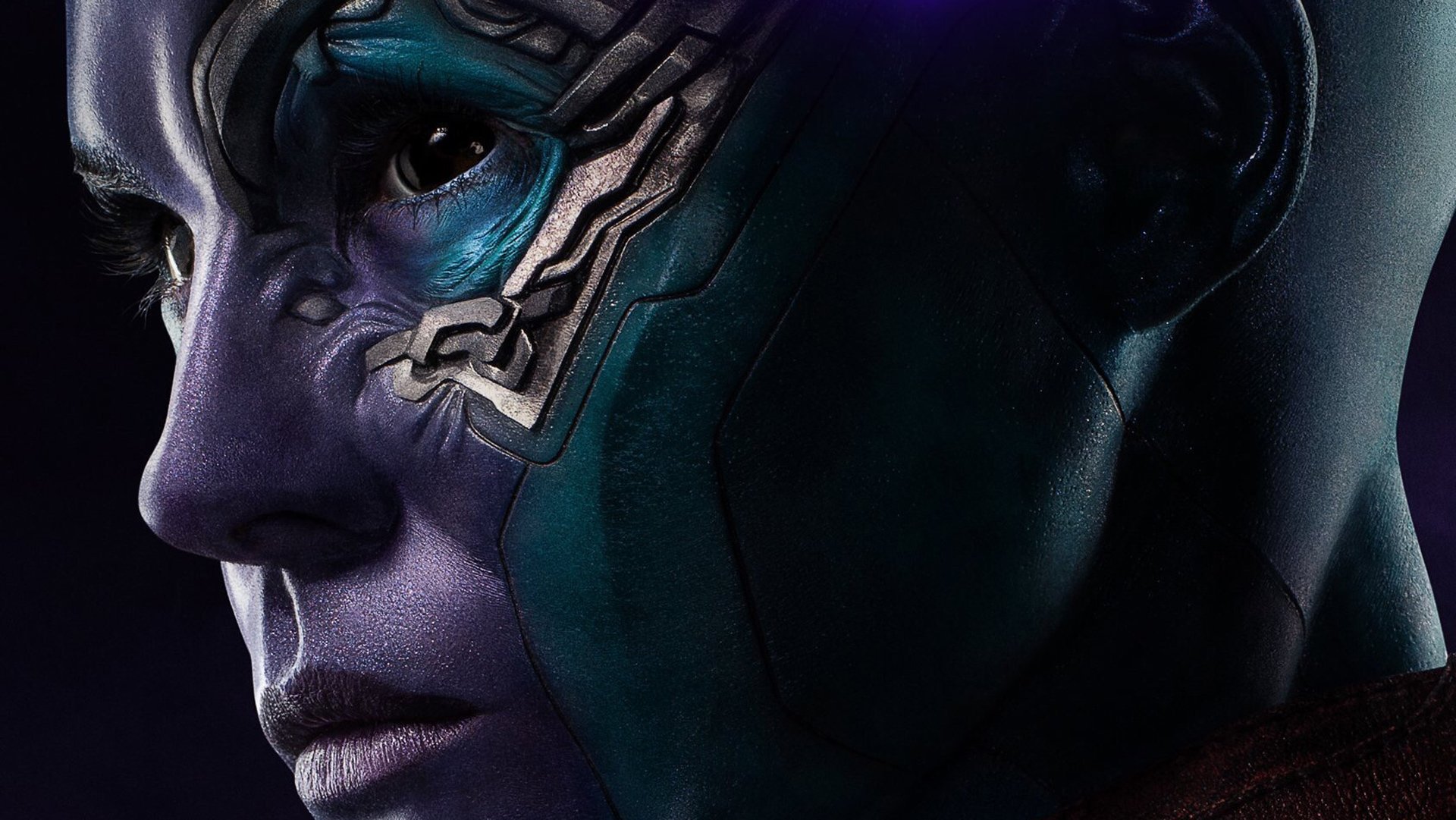 Close-up HD wallpaper of Karen Gillan as Nebula from Avengers Endgame, showcasing detailed blue and purple face markings and cybernetic enhancements.