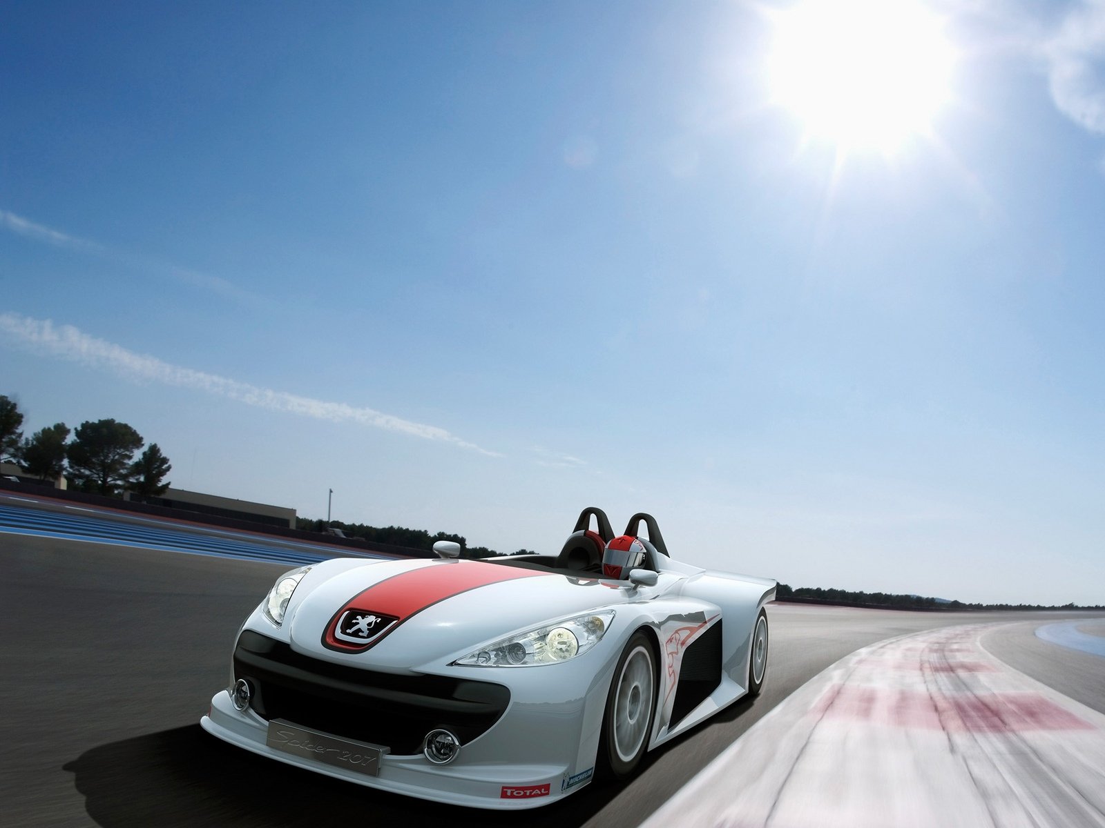 2006 Peugeot Spider Concept race car — white-and-red open-top roadster speeding on a racetrack; HD PC desktop wallpaper background.