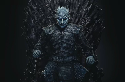 HD desktop wallpaper featuring the Night King from the TV show Game of Thrones, seated ominously on the Iron Throne.