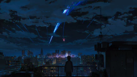 HD wallpaper and background from the anime Your Name featuring a night cityscape with a silhouette of a person on a balcony watching meteor trails in the sky.