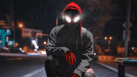 Miles Morales (Spider-Man) from Spider-Man: Into the Spider-Verse crouches on a rain-slick street at night, glowing eyes and red gloves — 2K Quad HD PC desktop wallpaper/background.
