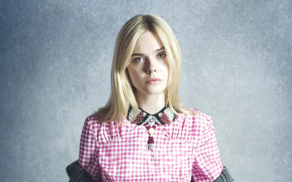 Portrait of blonde celebrity Elle Fanning in a pink checkered dress with a black collar, captured in high-resolution 4K Ultra HD for PC desktop wallpaper.