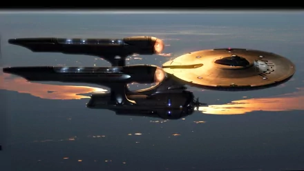 A stunning HD wallpaper featuring iconic Star Trek starships reflected in a tranquil surface, capturing the essence of sci-fi exploration and adventure.
