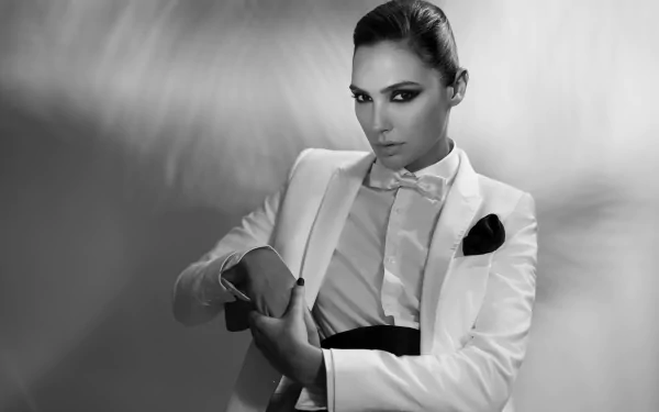 Black and white 4K Ultra HD portrait of Israeli actress and model Gal Gadot in a stylish tuxedo, exuding celebrity elegance and confidence.