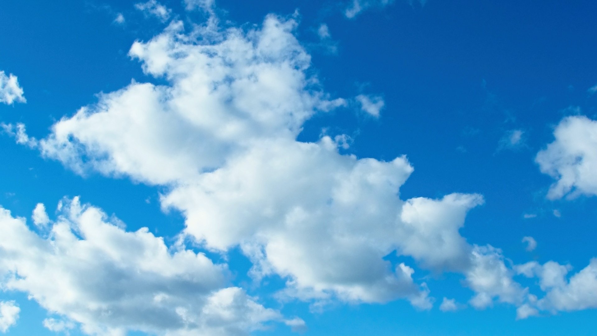 White Puffy Clouds in Blue Sky HD Wallpaper | Background Image | 1920x1080