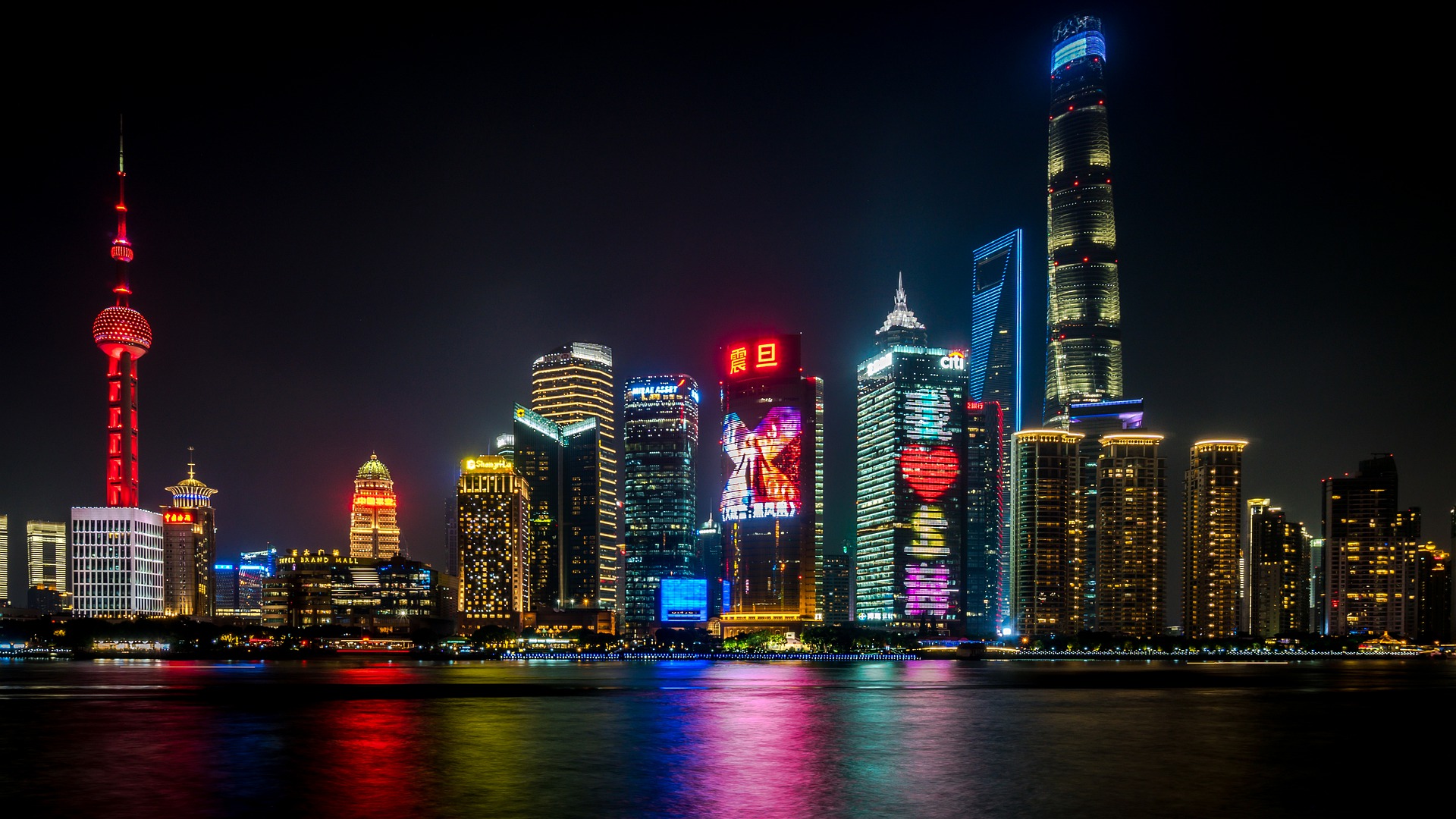 Shanghai Skyline Night Lights Reflecting In The Water Hd Wallpaper Background Image 19x1080 Id Wallpaper Abyss