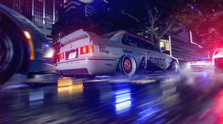 Neon-lit race car from Need for Speed Heat racing through wet city streets — video game 2K Quad HD PC desktop wallpaper/background.