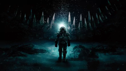 4K Ultra HD PC wallpaper: lone deep-sea diver in a glowing blue cavern surrounded by jagged spires — cinematic still from the movie Underwater.