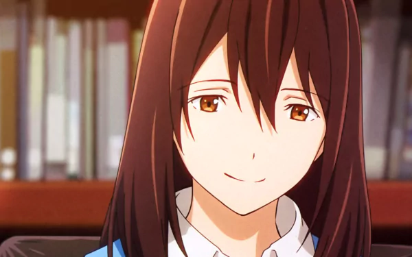 HD anime desktop wallpaper featuring Sakura Yamauchi from I Want To Eat Your Pancreas, showing her gentle smile and warm brown eyes against a blurred background.