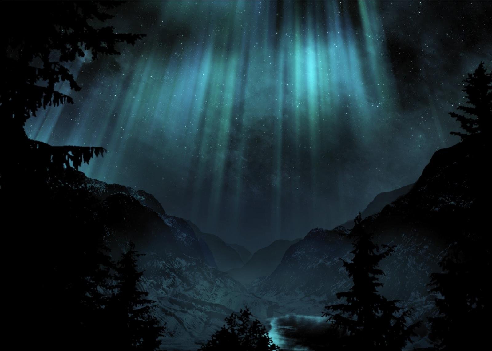 Scenic HD PC desktop wallpaper featuring a dark mountainous landscape illuminated by vibrant blue-green northern lights against a starry night sky.