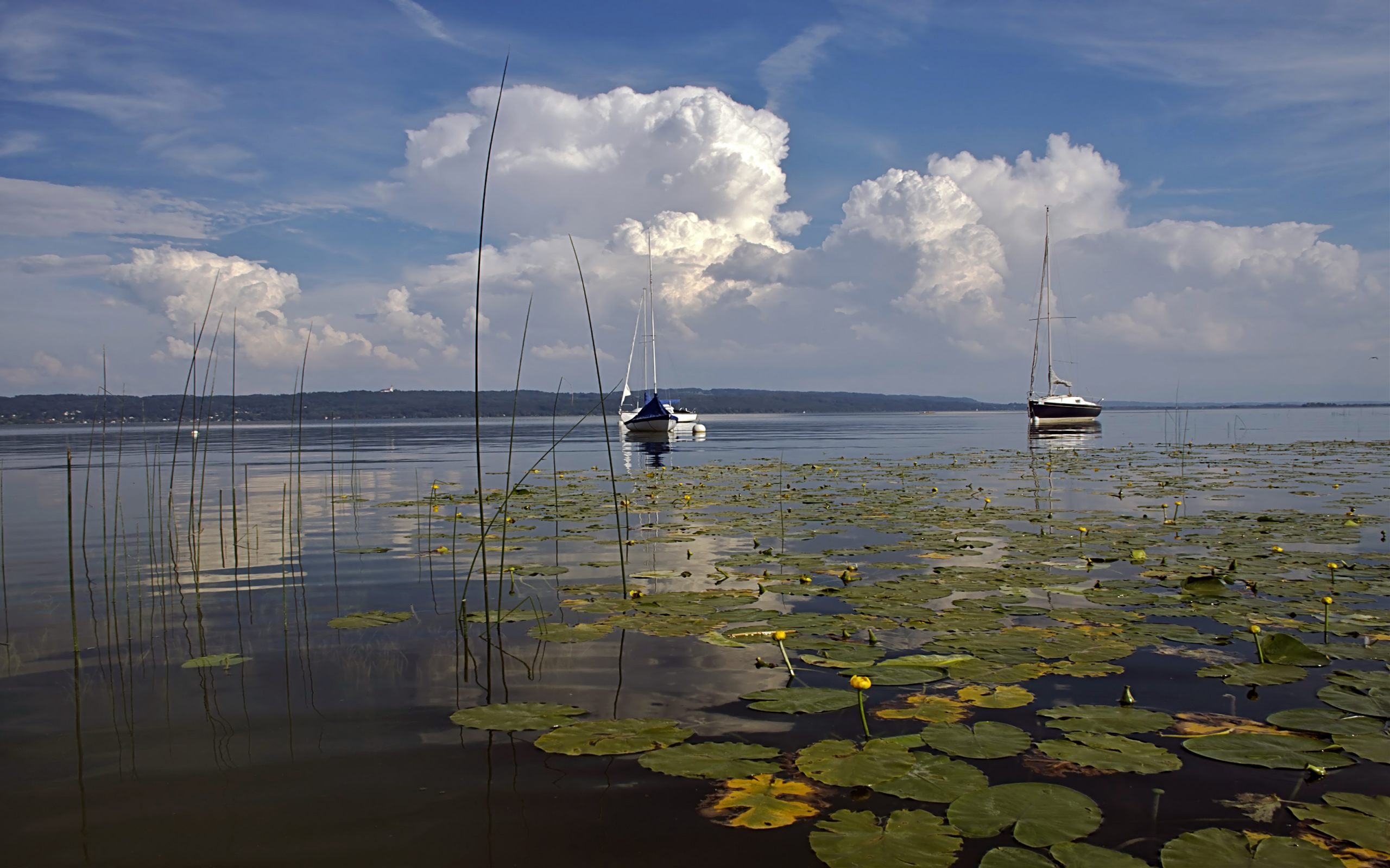 Idyllic view of Lake Ammersee surrounded by picturesque scenery.