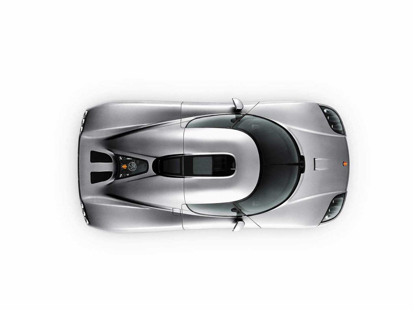 Top-down view of a sleek silver Koenigsegg CCX supercar, featured as an HD PC desktop wallpaper and background.
