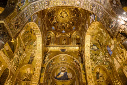 Golden mosaic interior of the Palatine Chapel in Palermo, Sicily, Italy — ornate religious church arches, domes and icons. 2K Quad HD PC desktop wallpaper/background.