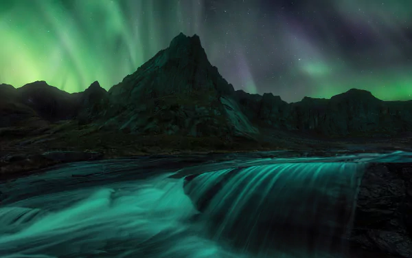 A 4K Ultra HD wallpaper of the Lofoten Islands featuring a vibrant aurora borealis under a starry sky above rugged mountains and flowing water.