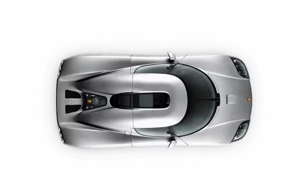 Top-down view of a sleek silver Koenigsegg CCX supercar, featured as an HD PC desktop wallpaper and background.