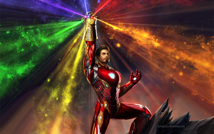 HD desktop wallpaper featuring Iron Man (Tony Stark) in the Mark 50 suit wielding the Infinity Gauntlet, from the movie Avengers EndGame. Vibrant energy beams emanate from the gauntlet stones.