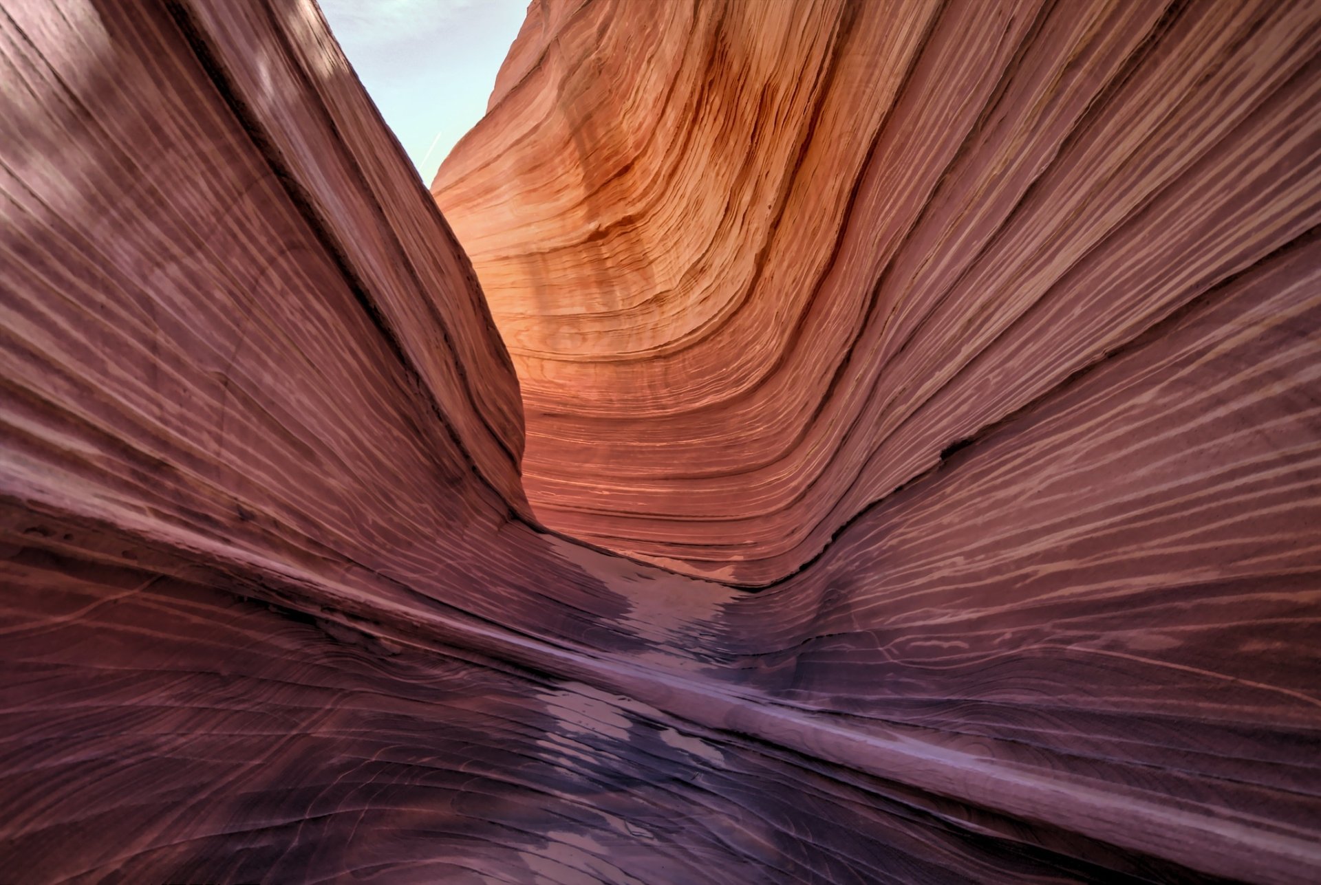 HD PC desktop wallpaper and background of the swirling sandstone canyon at Coyote Butts, Arizona, USA — layered red and orange rock walls carving a narrow nature canyon.