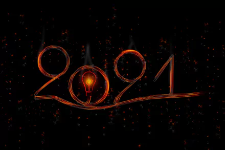 8K Ultra HD PC desktop wallpaper: glowing light bulb forms the zero in fiery '2021' script, festive sparks on a dark holiday New Year background.