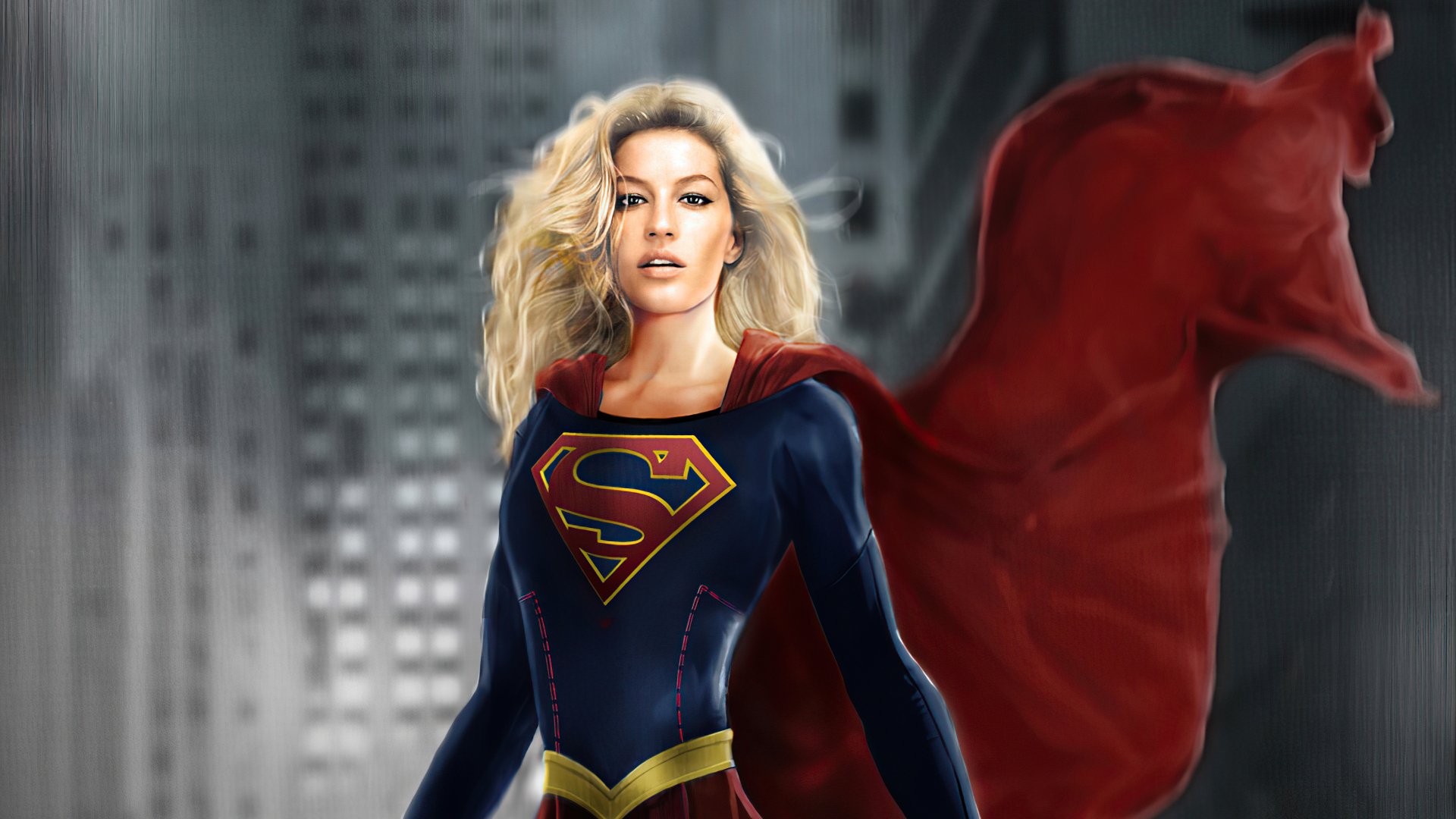 4K Ultra HD PC desktop wallpaper featuring Kara Zor-El as Supergirl from DC Comics, standing confidently with a flowing red cape against a blurred cityscape background.