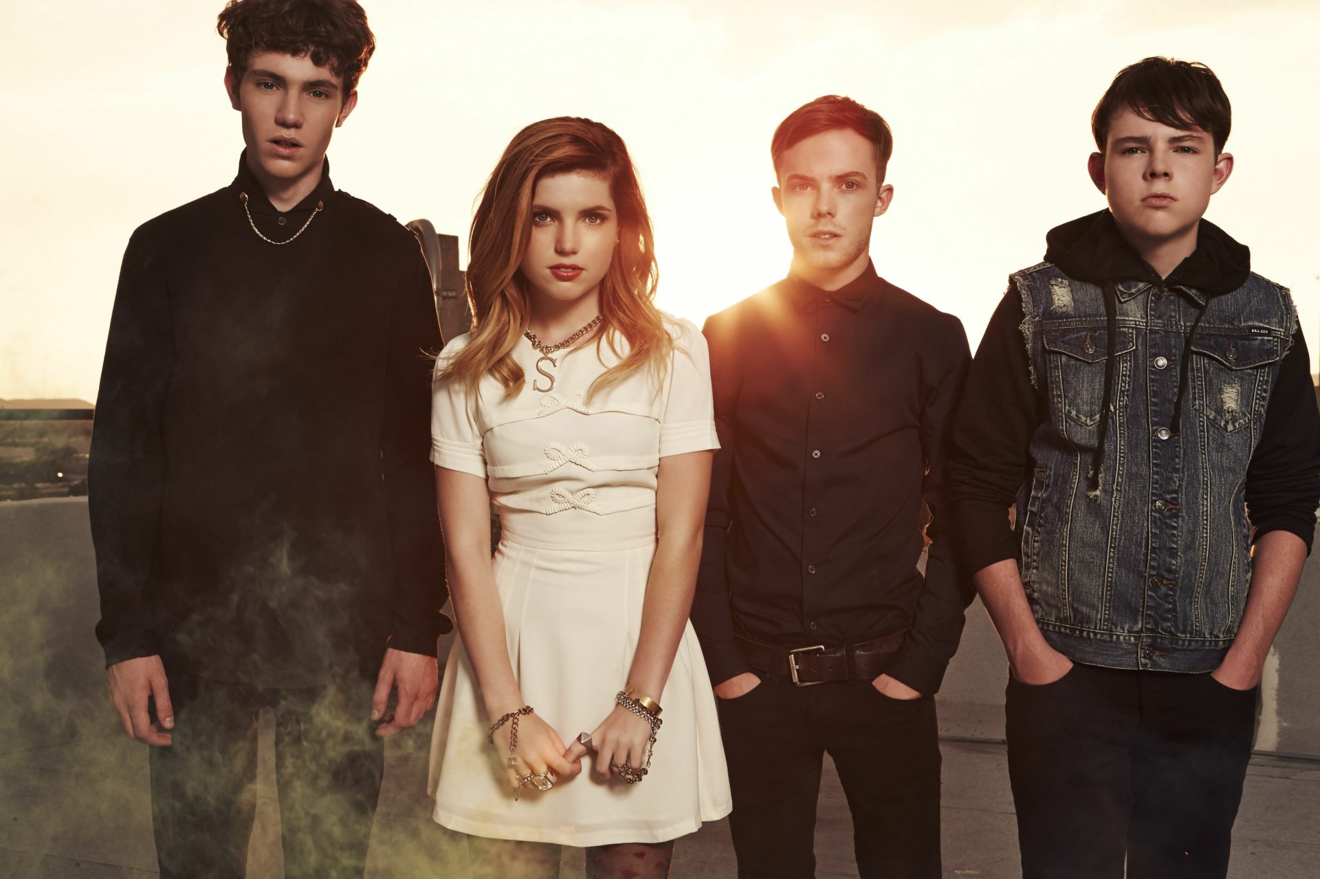HD desktop wallpaper featuring Echosmith with Sydney Sierota, posing confidently as a band at sunset.