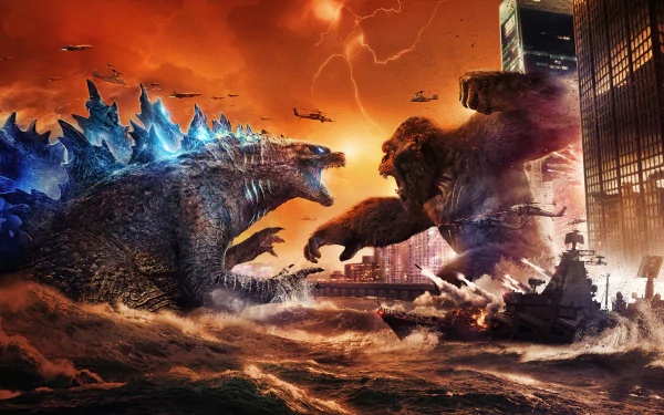 HD desktop wallpaper depicting an epic battle between King Kong and Godzilla amidst a fiery cityscape. This image is tagged with King Kong, Godzilla, movie, Godzilla vs Kong.