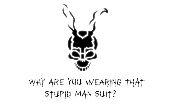 HD desktop wallpaper featuring a minimalist design from the movie Donnie Darko, showcasing a stylized rabbit mask with the text Why are you wearing that stupid man suit? beneath it.