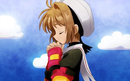 A serene HD desktop wallpaper featuring Cardcaptor Sakura, depicted with her eyes closed and hands together in prayer against a scenic blue sky with clouds.