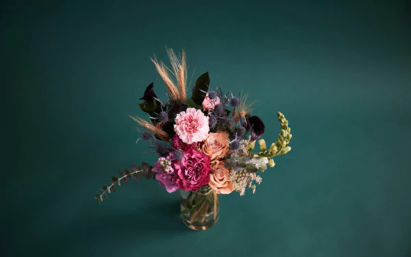  Vivid Floral Arrangement On Dark Teal