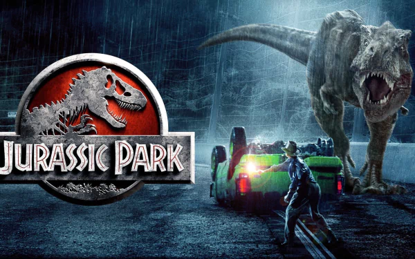HD PC desktop wallpaper featuring a dramatic Jurassic Park scene with a T-Rex, a jeep, and a character in a rainy, dark environment.
