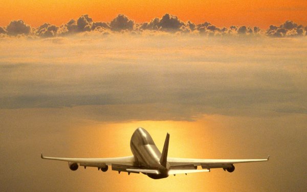 Vehicles Aircraft Sky Airplane Jet Cloud Yellow orange Silver HD Wallpaper | Background Image