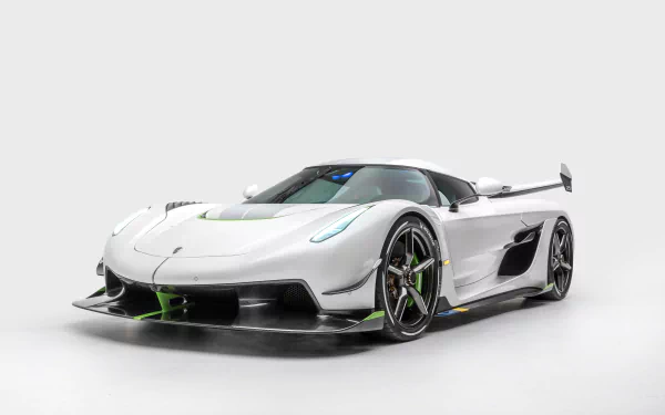 Sleek white Koenigsegg Jesko supercar showcased against a plain background, rendered in stunning 4K Ultra HD for PC desktop wallpaper and background.