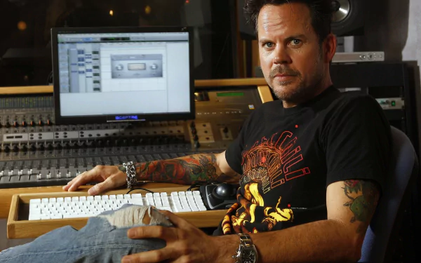 Man in recording studio for HD desktop wallpaper and background.
