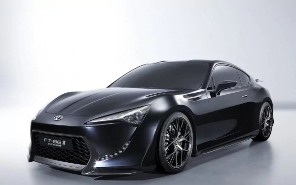 A sleek black Toyota FT-86 concept car showcased as a high-definition PC desktop wallpaper and background.