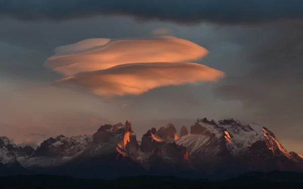  Lenticular clouds at sunrise, Torres del Paine, Chile by Marc Thunis