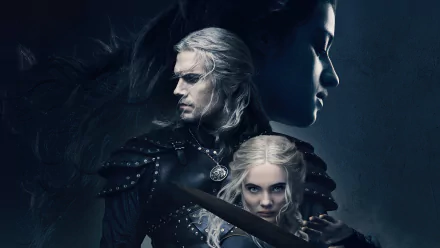 5K desktop wallpaper of Geralt of Rivia and Ciri from The Witcher TV show — armored silver‑haired witcher with sword beside Ciri against a dark, moody fantasy backdrop.