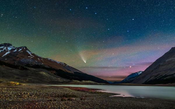  Comet NEOWISE streaks across the sky over Sunwapta Lake in Jasper National Park, Alberta, Canada