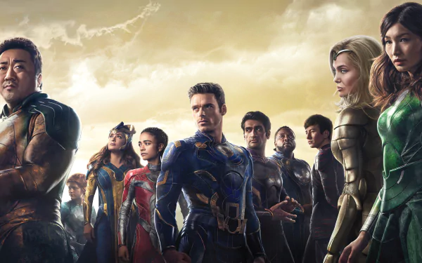 4K Ultra HD PC desktop wallpaper featuring the cast of the movie Eternals standing together against a dramatic cloudy sky backdrop.