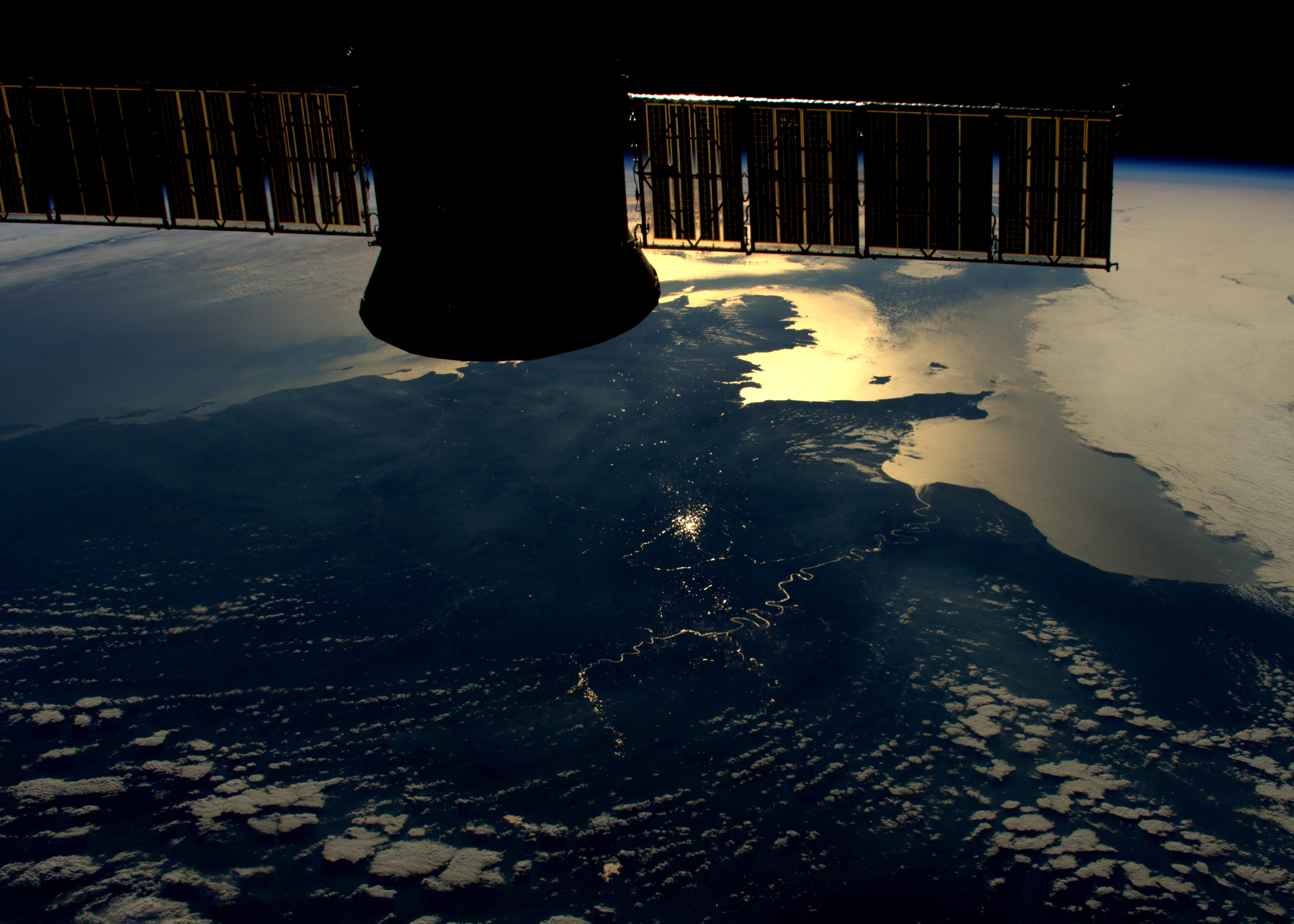 Sun reflecting the route of La Seine winding its way down to Paris by Tim Peake