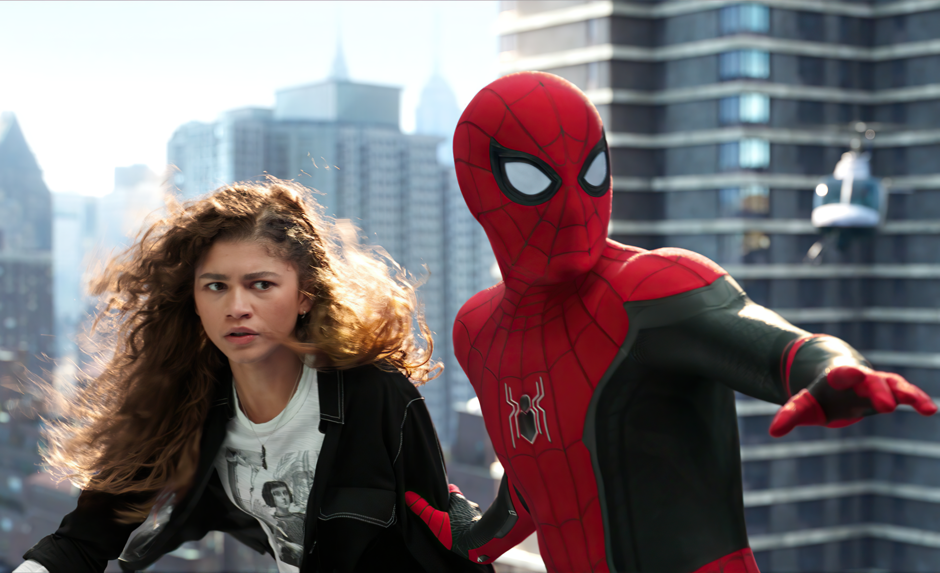 Michelle 'MJ' Jones and Spider-Man, portrayed by Zendaya and Spider-Man: No Way Home, featured in a 4K Ultra HD PC desktop wallpaper with a cityscape background.