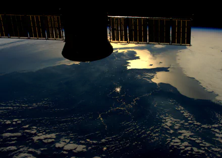  Sun reflecting the route of La Seine winding its way down to Paris by Tim Peake