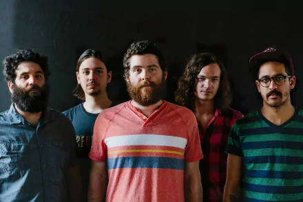 HD wallpaper featuring a group portrait of the indie rock band Manchester Orchestra as a desktop background.