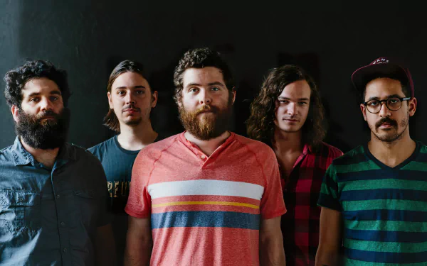 HD wallpaper featuring a group portrait of the indie rock band Manchester Orchestra as a desktop background.