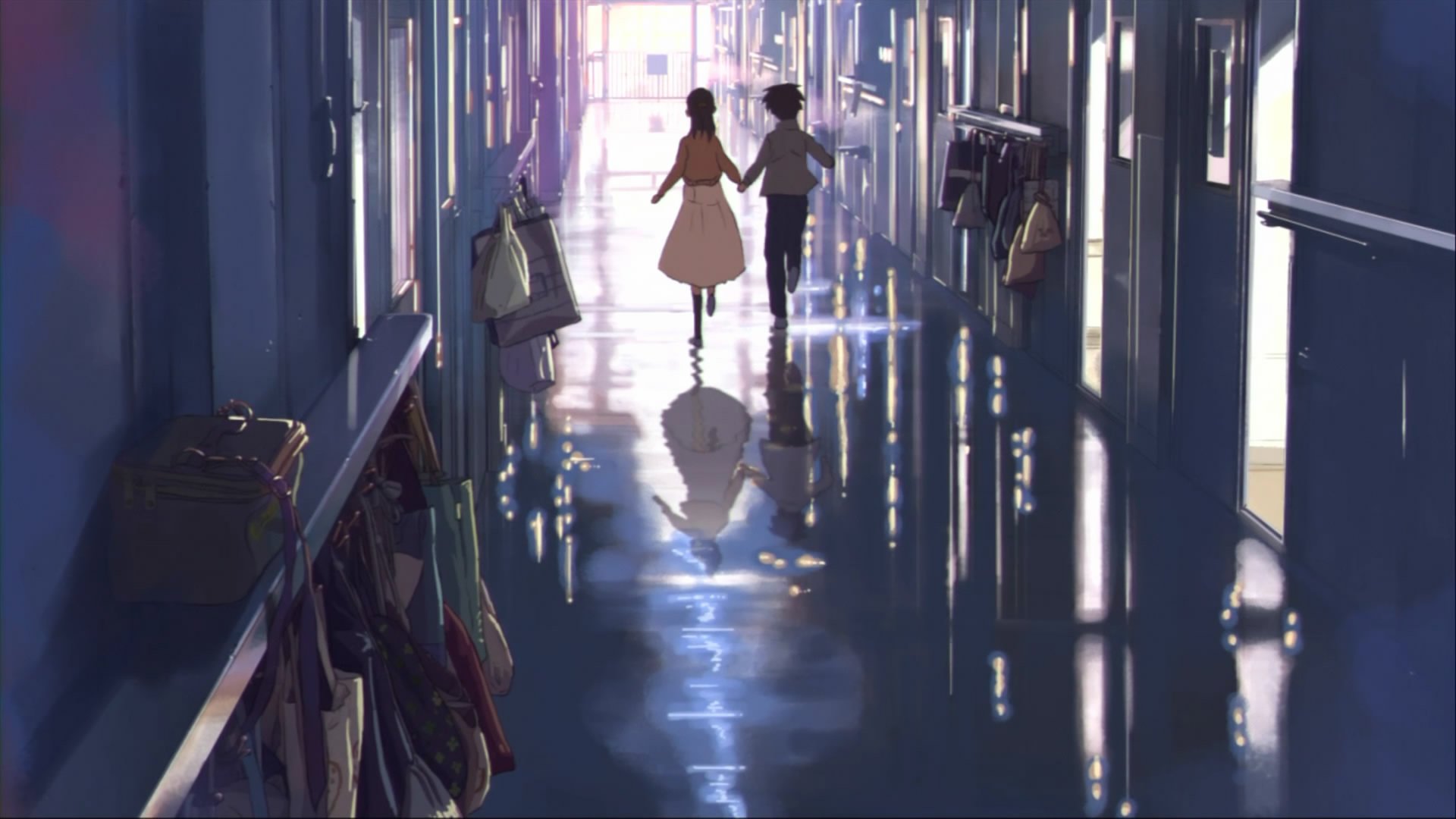 A serene HD wallpaper from 5 Centimeters per Second, featuring Akari Shinohara and Takaki Touno walking hand in hand through a reflective school hallway.