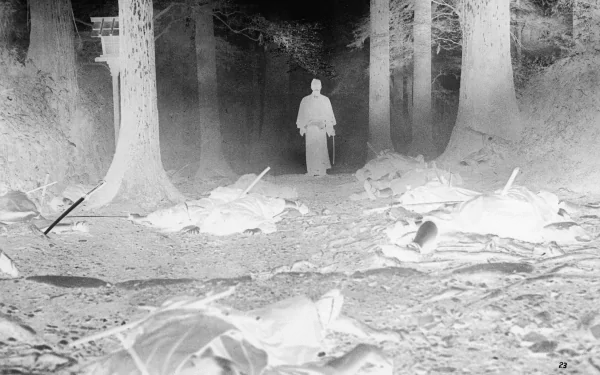 A haunting HD wallpaper featuring a lone figure standing in a dark forest, surrounded by fallen warriors, inspired by the anime Rurouni Kenshin.