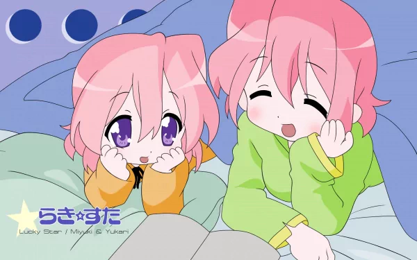HD desktop wallpaper of Lucky Star characters Yukari Takara and Miyuki Takara snuggled under a blanket; pink-haired, purple-eyed, one shy-eyed and one smiling with eyes closed.