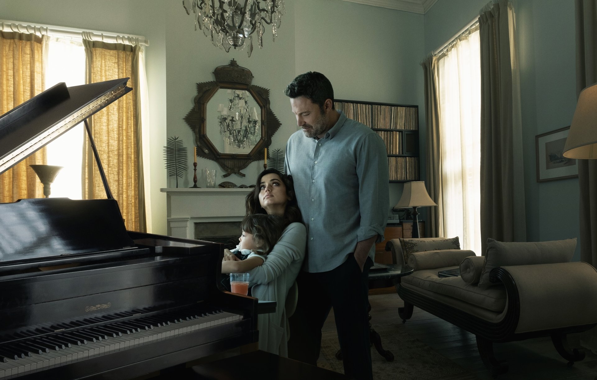 4K Ultra HD desktop wallpaper: film still from Deep Water showing a man standing behind a woman at a grand piano in a moody, sunlit living room.