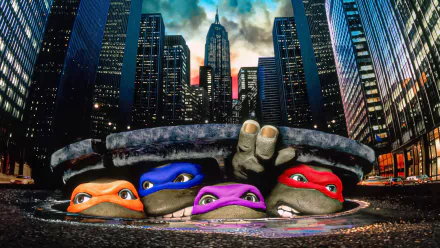 HD PC desktop wallpaper featuring Raphael, Michelangelo, Leonardo, and Donatello from the 1990 Teenage Mutant Ninja Turtles movie peeking out of a city manhole.