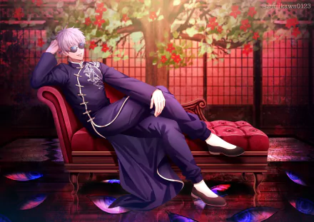 HD PC desktop wallpaper featuring Satoru Gojo from the anime Jujutsu Kaisen, lounging confidently on a red chaise with a vibrant, detailed background.