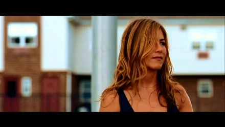 HD PC desktop wallpaper featuring Jennifer Aniston from the movie The Bounty Hunter, capturing her with a casual, confident expression in an outdoor setting.