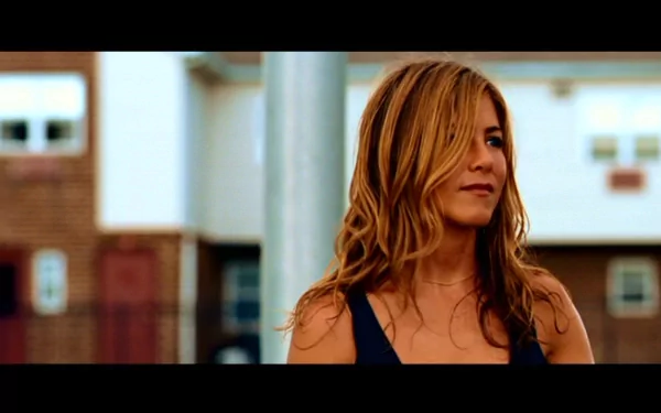 HD PC desktop wallpaper featuring Jennifer Aniston from the movie The Bounty Hunter, capturing her with a casual, confident expression in an outdoor setting.